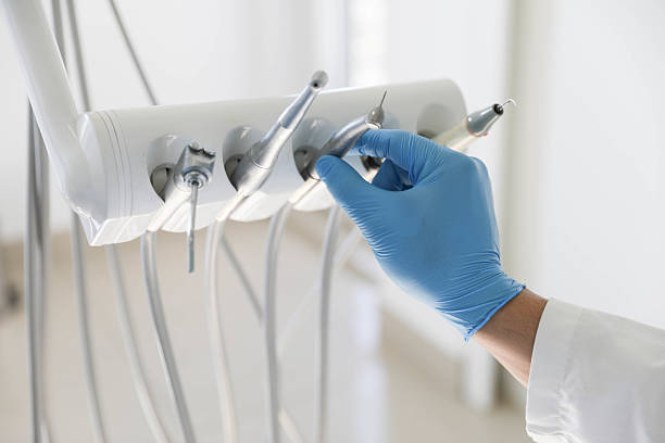 Professional Tooth Extraction technician working in Norwood, NC